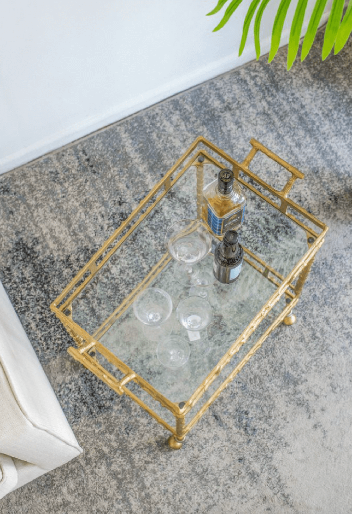 Carrito bar dorado con vidrio