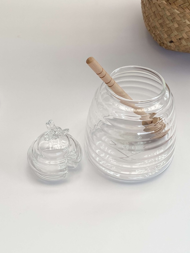 Glass honey jar with dipper