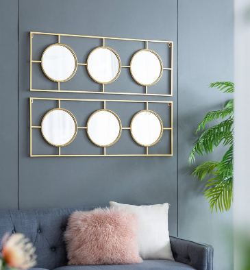 Decoracion de pared con espejo triple dorado