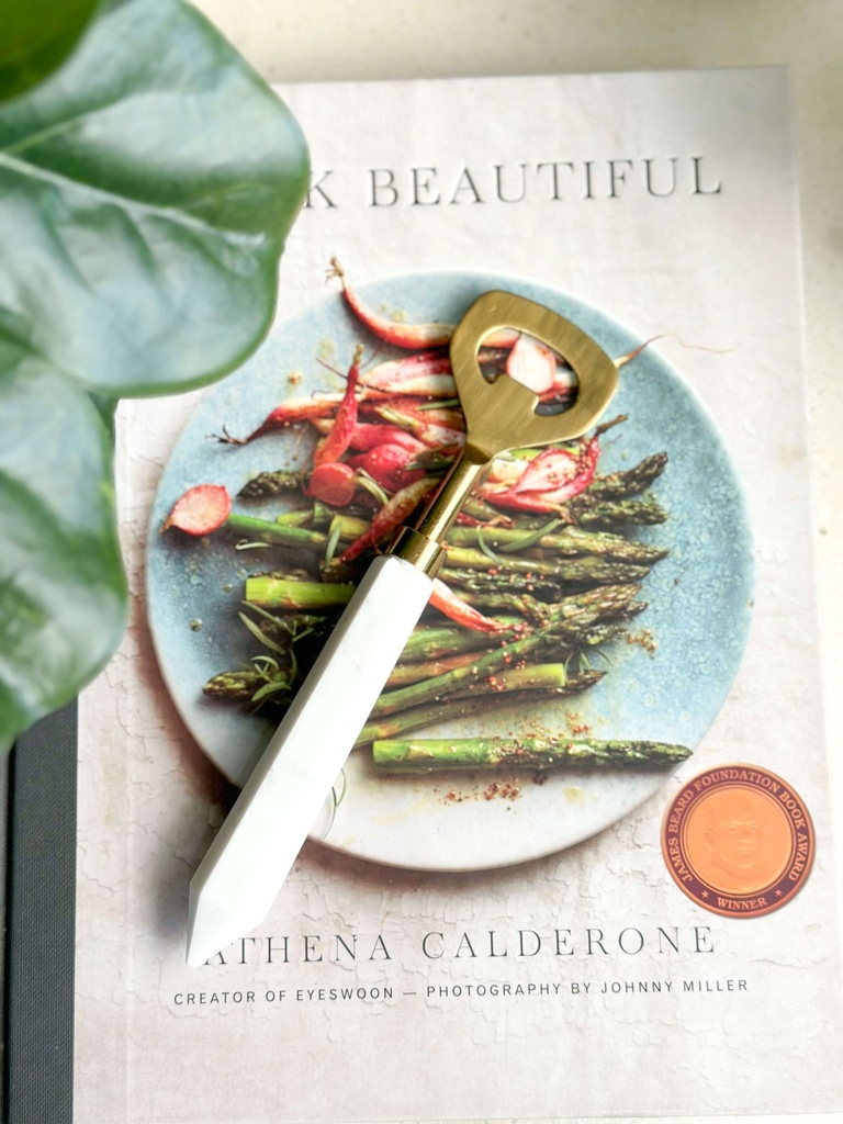 Destapador de marmol dorado