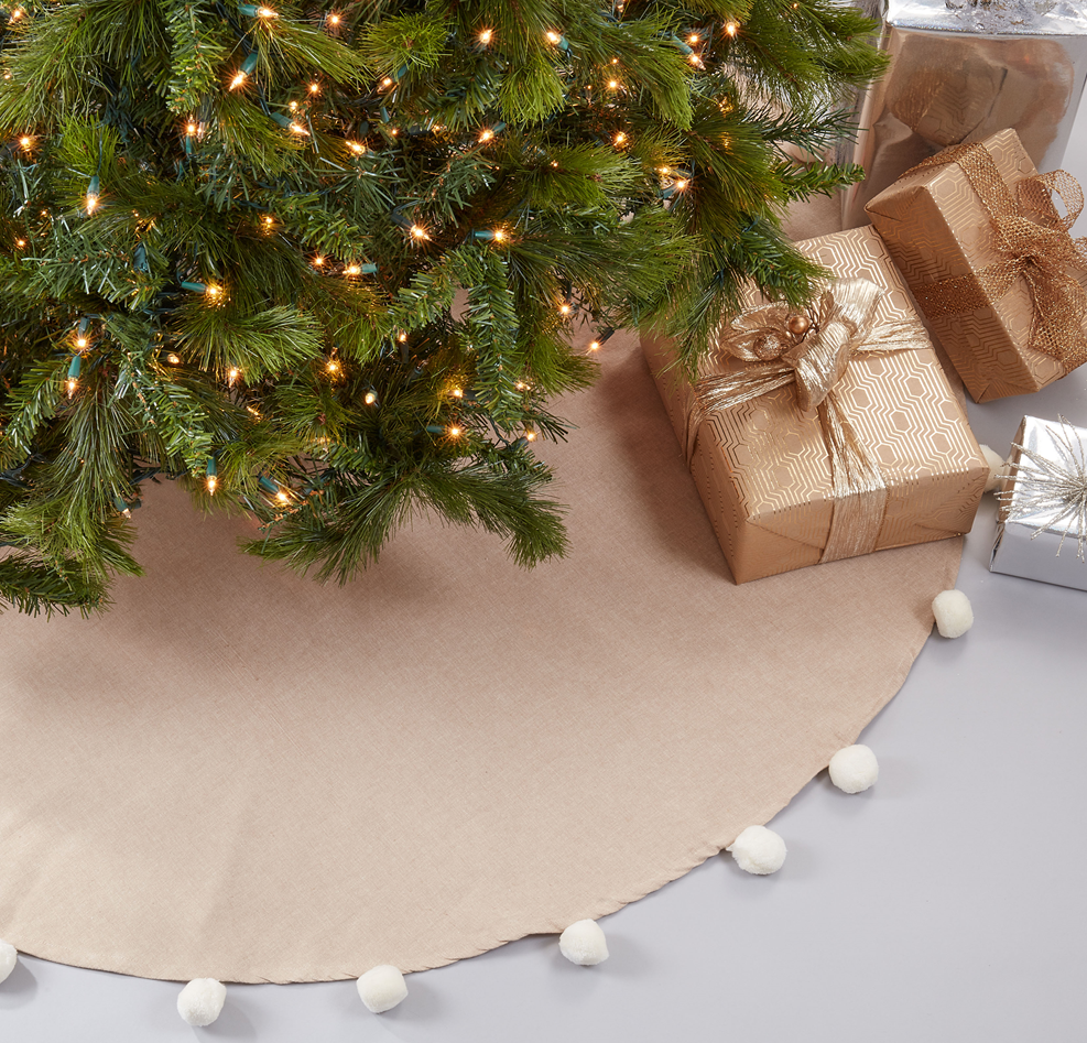 Falda para arbol beige con pom pom