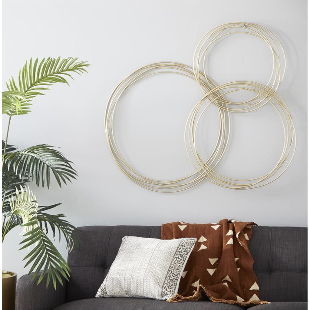 Pieza Circulos dorada para pared