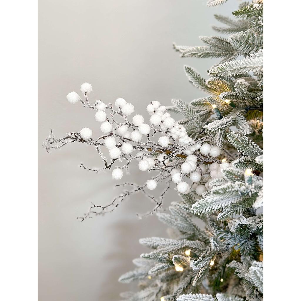 Rama de berries blancas nevada