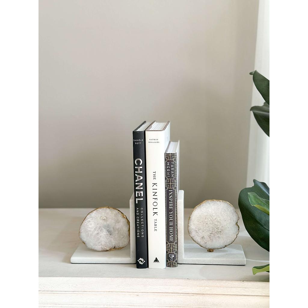 Sujeta libros de Agata y Mármol