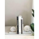 Sujeta libros de Agata y Mármol