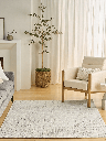 Alfombra gris con tonos marfil