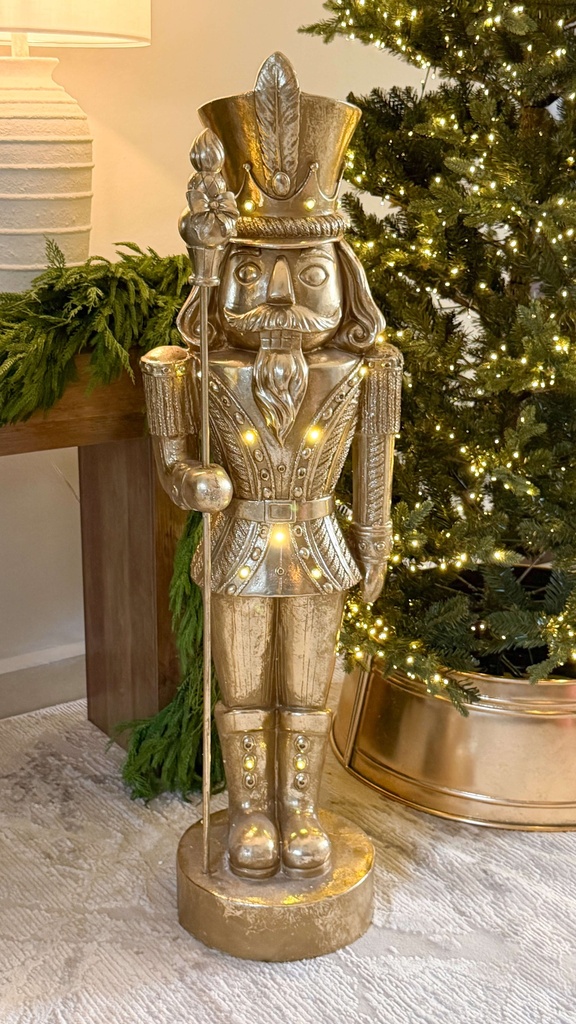 Nutcracker dorado oversized con luz led
